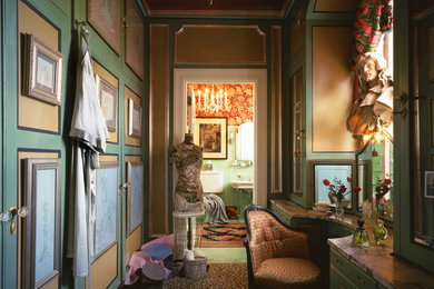 Inspiration for a small victorian women's carpeted dressing room remodel in Bridgeport with green cabinets