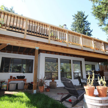 Addition with a waterproof deck above