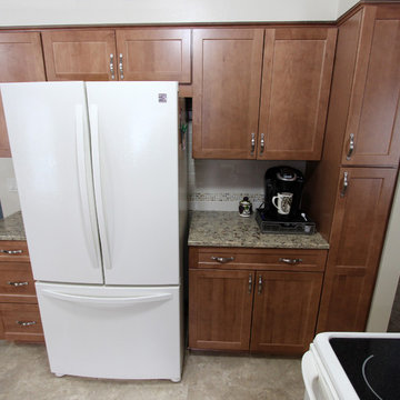 Waypoint Maple Spice Cabinets with Eternia Quartz Claremont Countertops