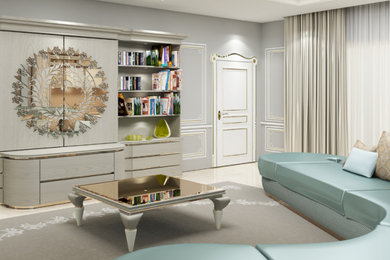 Foto de sala de estar con biblioteca clásica de tamaño medio con paredes grises, suelo de mármol, televisor retractable, suelo beige, casetón, boiserie y alfombra