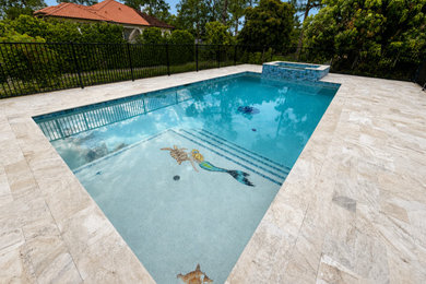 Inspiration for a tropical pool remodel in Other