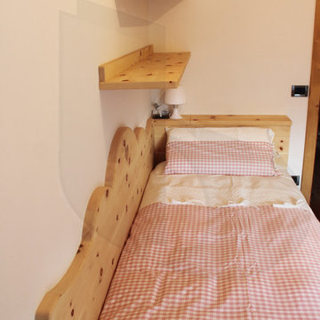 Camera da letto in legno di Cirmolo