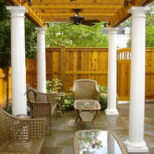 Cedar Pergola With Flagstone Patio And Fieldstone Retaining