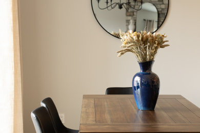 Transitional dining room photo in Calgary