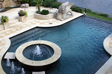 Patio fountain - tile patio fountain idea in Miami