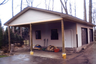 Inspiration for a traditional two-car garage in Other.