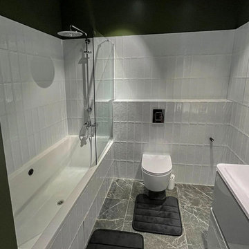 Modern Green Bathroom with White Subway Tile and Wall-Hung Toilet – Moscow Apart