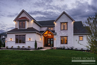 Example of a transitional exterior home design in Kansas City