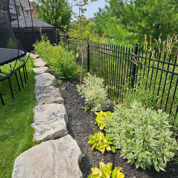 Natural Stone Retaining Wall with Perimeter Planting