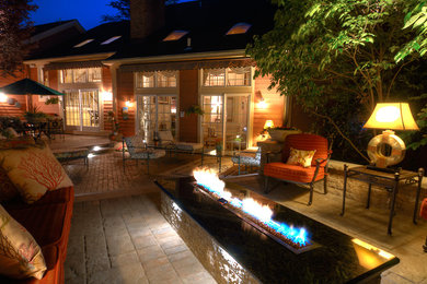 Patio - mid-sized transitional backyard brick patio idea in San Diego with a fire pit and no cover
