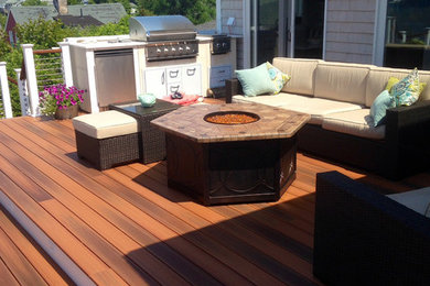 Design ideas for a large traditional rooftop deck in Kansas City with an outdoor kitchen and no cover.