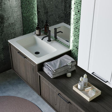 Contemporary green bathroom with wall mounted vanity