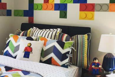 Example of a minimalist kids' room design in Other