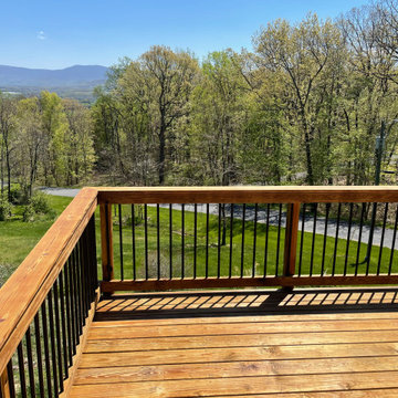 Deck stain and gutters powerwash