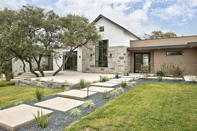 Transitional exterior home photo in Austin
