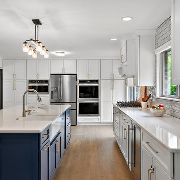 Starmark Bridgeport Kitchen & Primary Bath in White & Blueberry