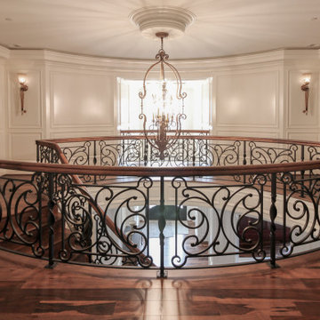 Project #74 | Circular Staircase with Hand-Forged Metal Panels