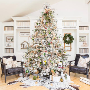 Inspiration for a large cottage formal and enclosed light wood floor and beige floor living room remodel in San Diego with white walls, no fireplace and no tv