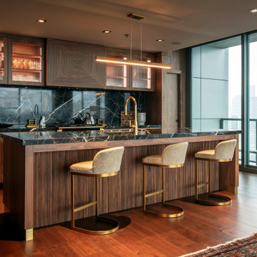 Modern Walnut Penthouse with Dramatic Marble Kitchen