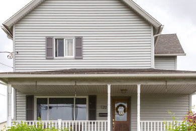 Example of an arts and crafts exterior home design in Other