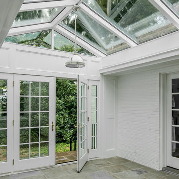 Sunroom enclosure with glass ceiling