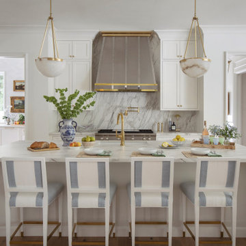 Calacatta WOW Satin A-Tech Porcelain Island, Range, and Backsplash with Mitered