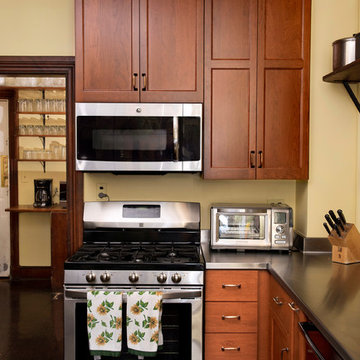 Cherry Kitchen with Steel and Butcher Block Countertops