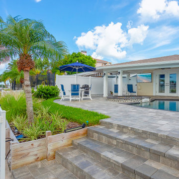 Tropical Waterfront Oasis with Private Dock and Resort-Style Outdoor Living