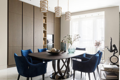Photo of a traditional kitchen/dining room in Moscow with beige walls, porcelain flooring and white floors.