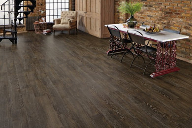 Photo of a country dining room in Other with vinyl floors.