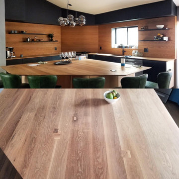 Kitchen with large white oak island