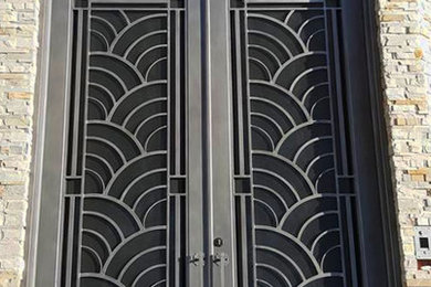 This is an example of a large front door in Melbourne with a double front door and a metal front door.