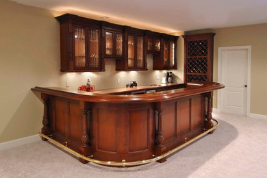 This is an example of a mid-sized traditional home bar in Other.