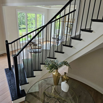 Project #130 | Curved Staircase with Wraparound Balcony