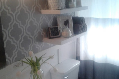Bathroom - small ceramic tile bathroom idea in Vancouver with a one-piece toilet and gray walls