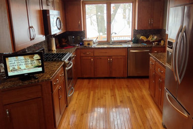 This is an example of a transitional kitchen in Grand Rapids.