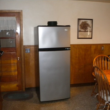 BEFORE   Cherry Cabinets with Typhoon Bordeaux Granite Counter Tops