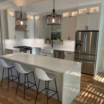 Transitional Kitchen, Bath and Laundry Remodel Done in a White Shaker