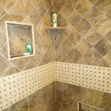 Showy Shower features shelf storage and a toe ledge