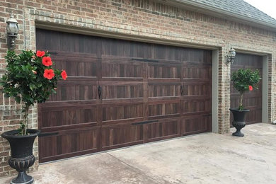 Inspiration for a large craftsman attached three-car garage remodel in Oklahoma City