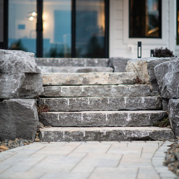 Luxury Backyard Retreat with Armour Stone & Water Feature | Genesis on the Lakes