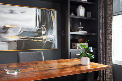 Inspiration for a modern home office remodel in Austin with blue walls