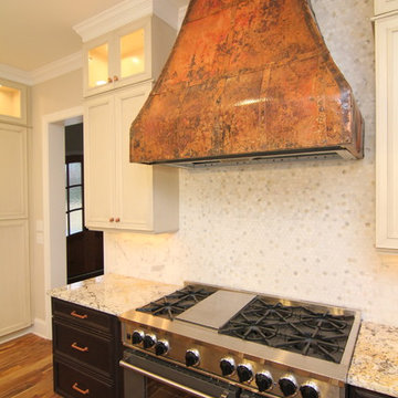 Copper Range Hood and Extended Gas Range
