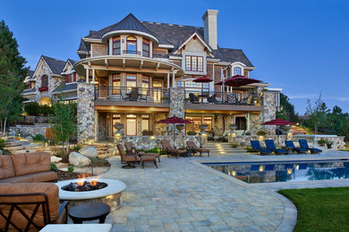 Patio - large traditional patio idea in Denver