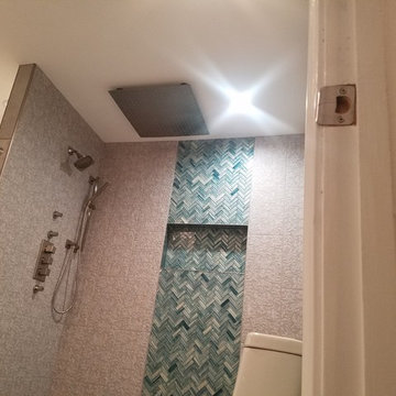 Basement Bathroom with Herringbone Shower Accent