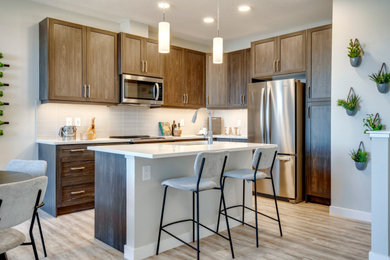 Example of a trendy kitchen design in Calgary