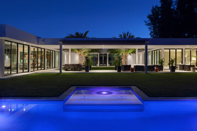 Example of a minimalist exterior home design in Miami