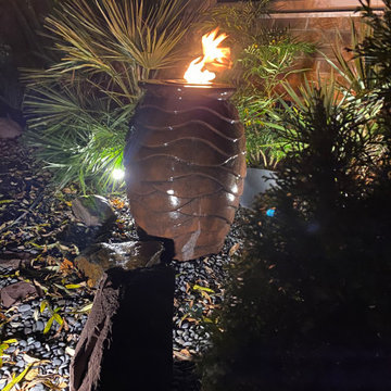Aquascape Scalloped urn installation with lights and fire fountain