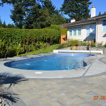 Fibreglass Pool in Saanich with Beautiful Stone Walls