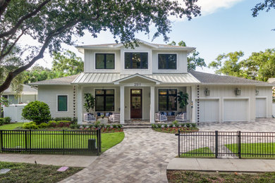 This is an example of a beach style house exterior in Tampa.